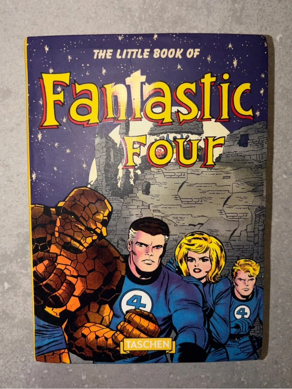 Taschen Fantastic Four Hardcover - Blue, Yellow, Orange marvel comic book little